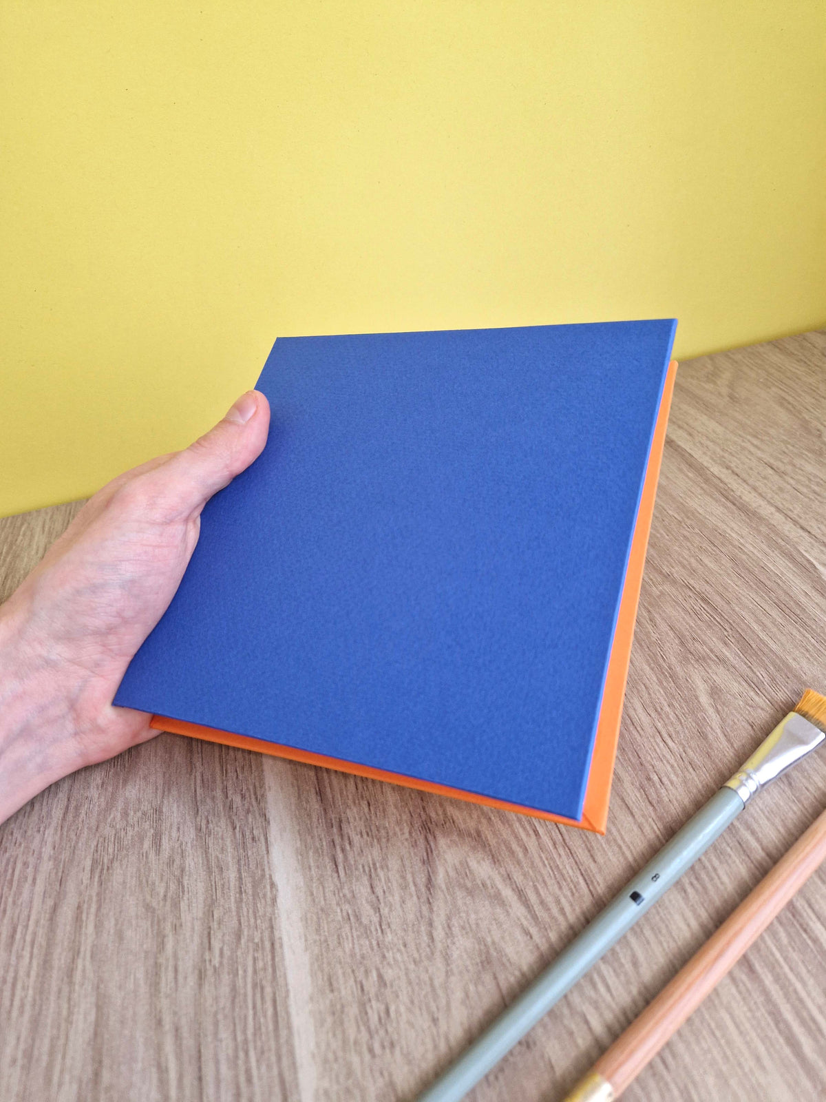 Carnet carré 15×15 aquarelle – Bleu marine & Orange