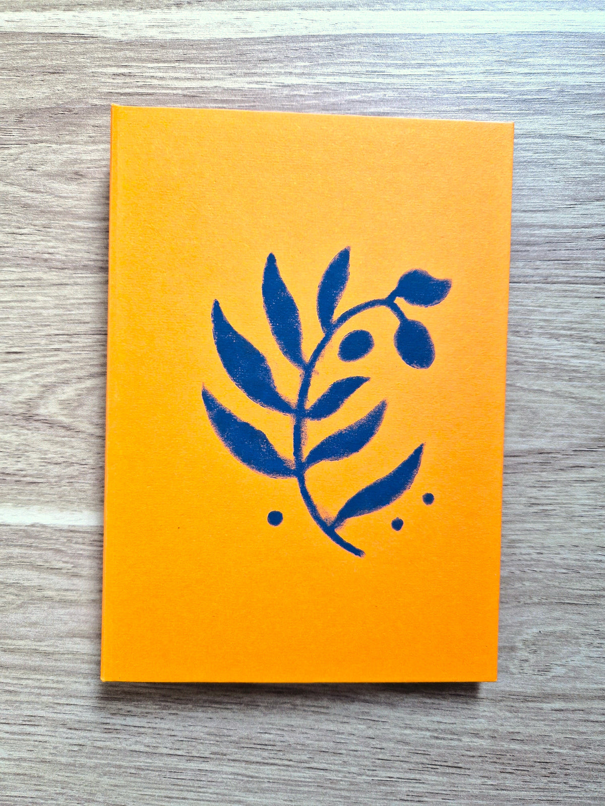 Carnet Orange – Branche d’olivier