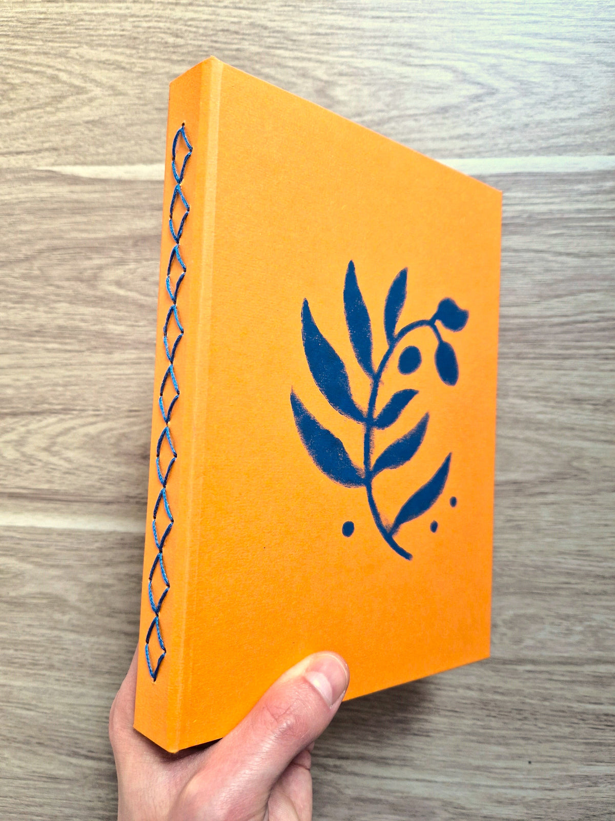 Carnet Orange – Branche d’olivier